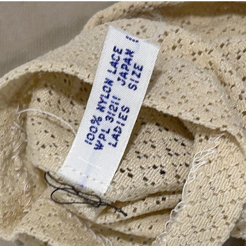 Vintage mid-century nylon lace‎ gloves, likely produced in Japan.